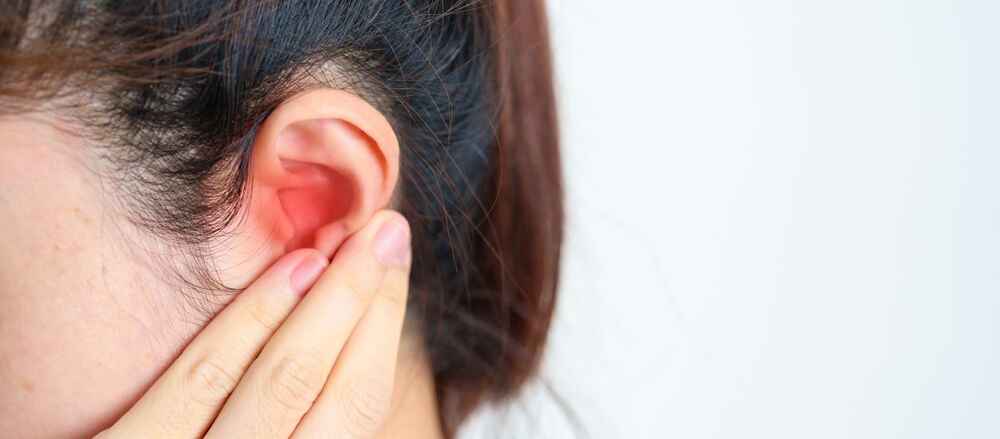 Woman with ear infection