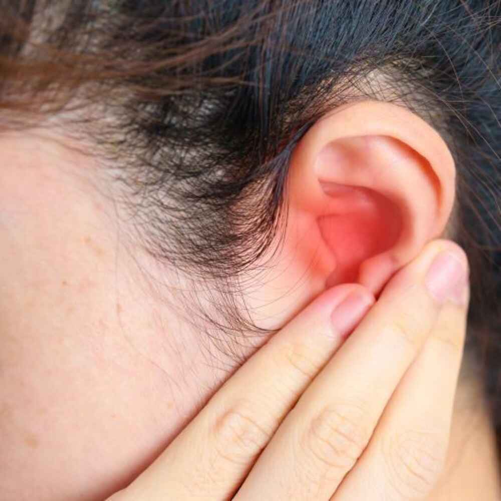 Woman with ear infection