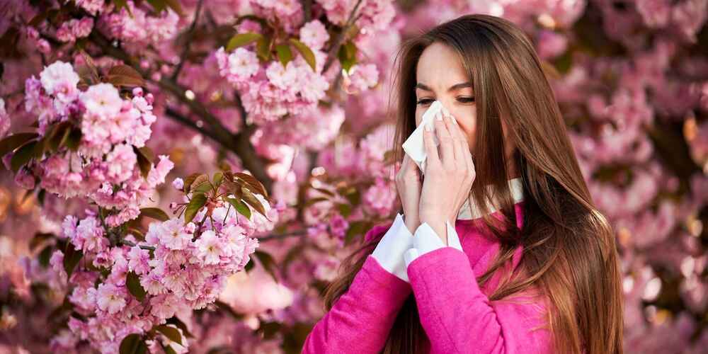 Woman suffering from allergies