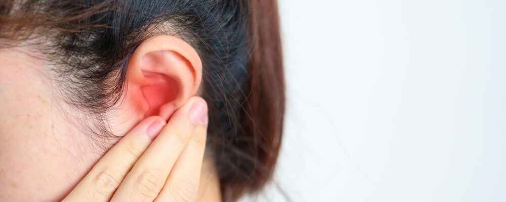 Woman with ear infection